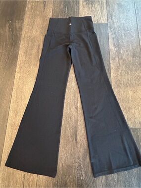 Athleta Salutation Stash Flare Pant Black, Small Petite